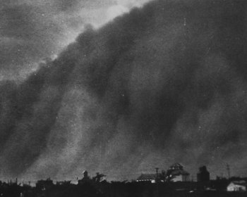 A "black blizzard" dust storm -- South Dakota, 1934.
Image: National Archives, FDR Library, public domain photographs. 